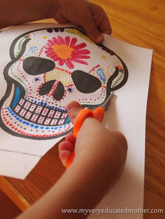 Smiling (not scary!) printable skull masks to celebrate the Day of the